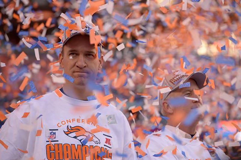 DENVER, CO - JANUARY 19: Denver Broncos quarterback Peyton Manning (18) during the trophy presentations after the game. The Denver Broncos take on the New England Patriots in the AFC Championship game at Sports Authority Field at Mile High in Denver on January 19, 2014. (Photo by John Leyba/The Denver Post)